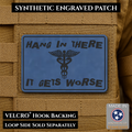Hang In There It Gets Worse Funny Medical Morale Patch, 2x3" | Made in USA | VELCRO® Brand Hook Backing