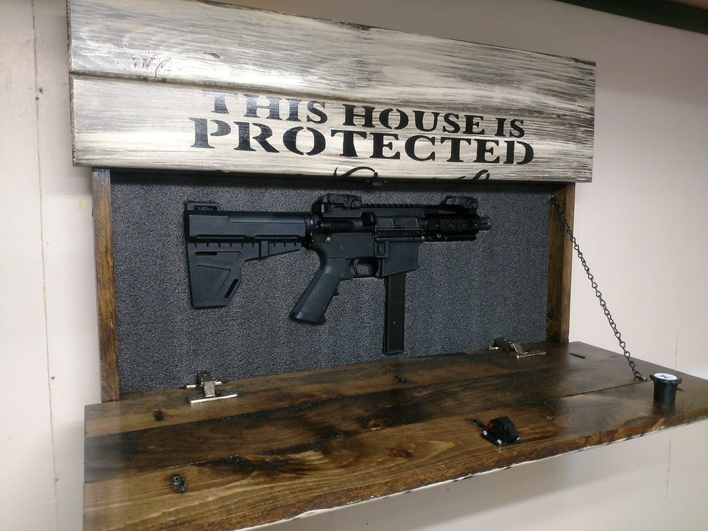 This House is Protected Hidden Gun Storage Sign
