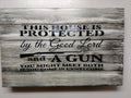 This House is Protected Hidden Gun Storage Sign