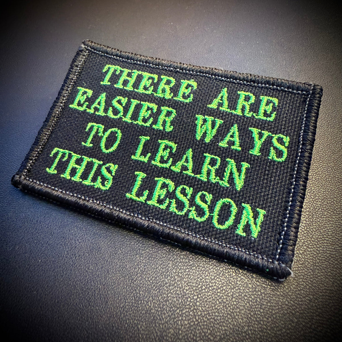 Hard Life Lessons Funny Morale Patch, 2x3" | Made in USA | VELCRO® Brand Hook Backing