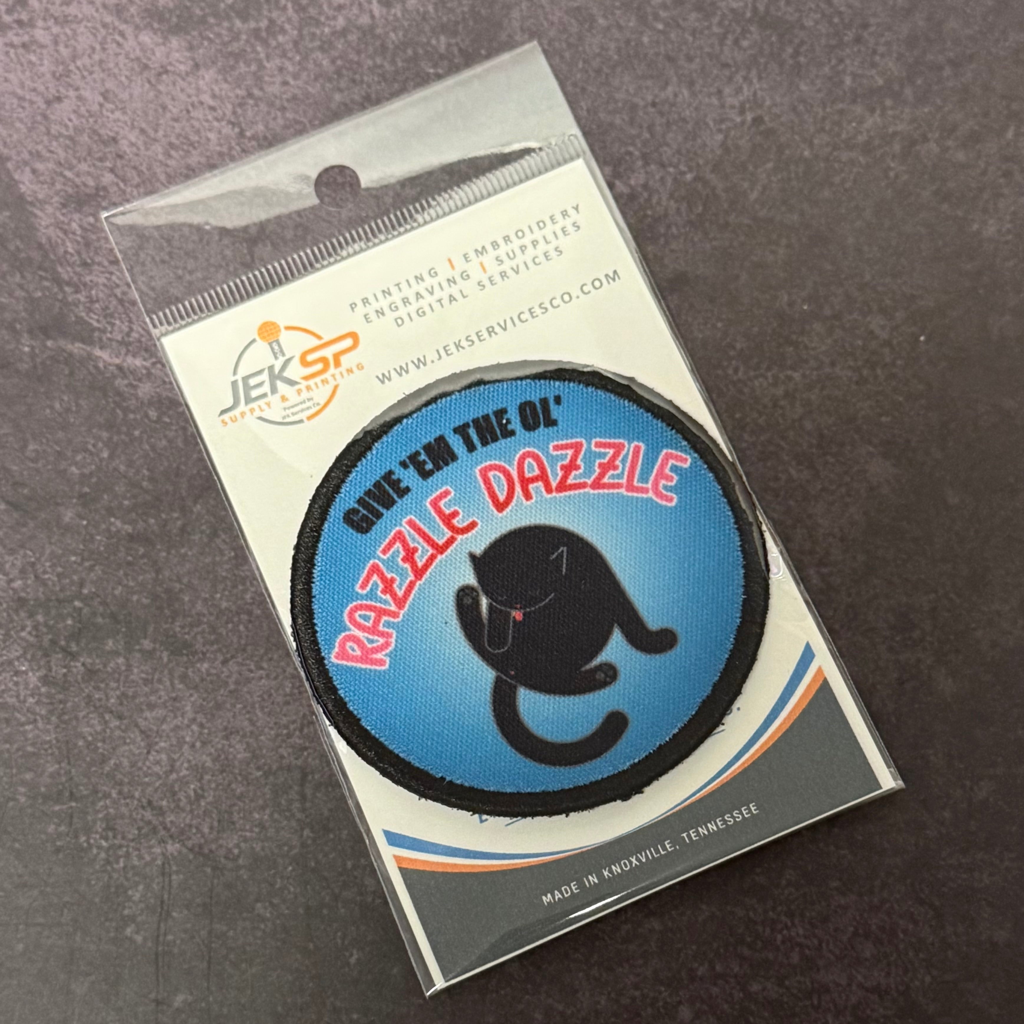 Give 'Em The Razzle Dazzle Funny Morale Patch | Made in USA | VELCRO® Brand Hook Backing