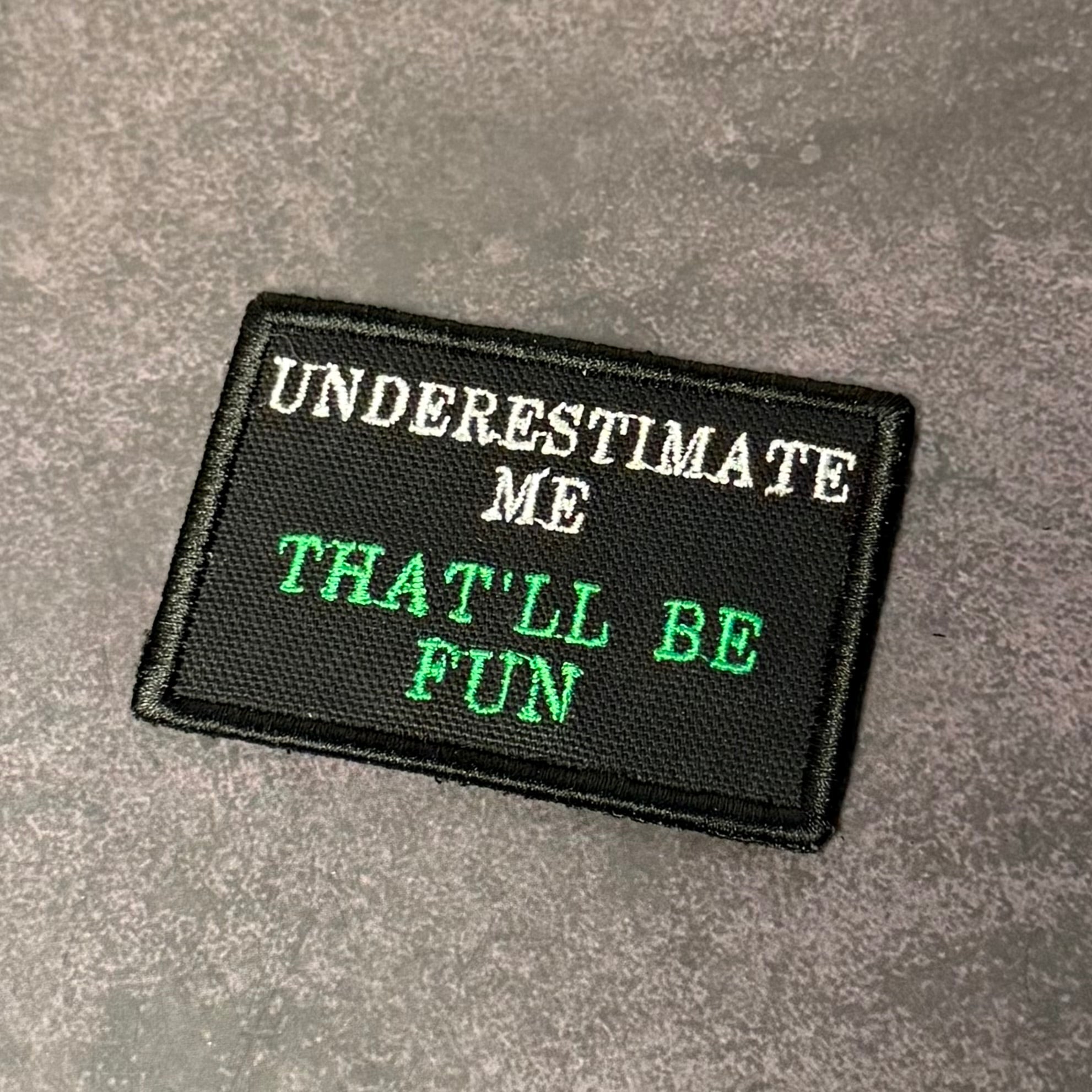 Underestimate Me, That'll Be Fun Funny Morale Patch, 2x3" | Made in USA | VELCRO® Brand Hook Backing