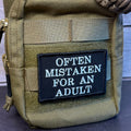 Often Mistaken For An Adult Funny Morale Patch, 2x3" | Made in USA | VELCRO® Brand Hook Backing