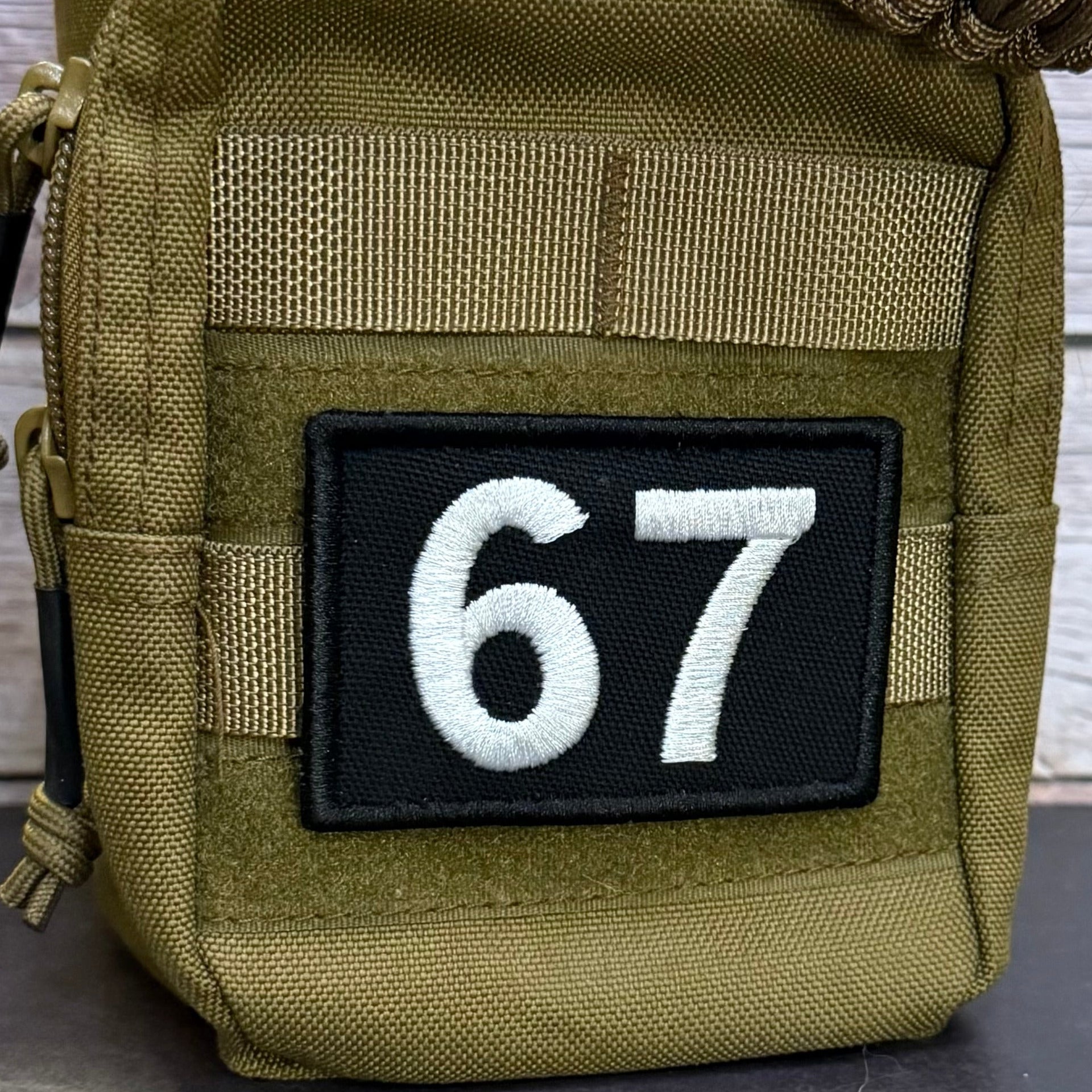 67 -Six Seven- Funny Morale Patch, 2x3" | Made in USA | VELCRO® Brand Hook Backing