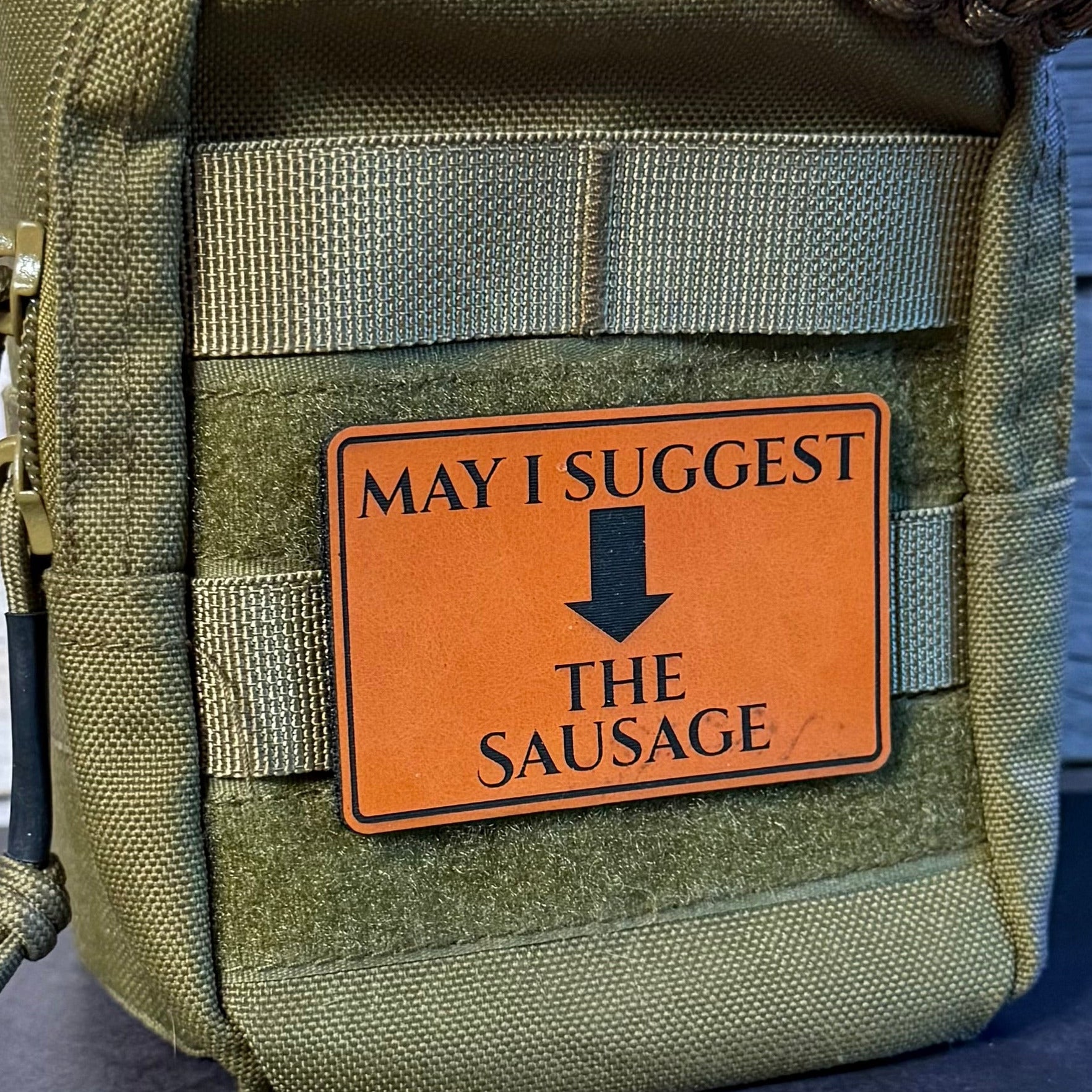 May I Suggest The Sausage Funny Morale Patch, 2x3" | Made in USA | VELCRO® Brand Hook Backing