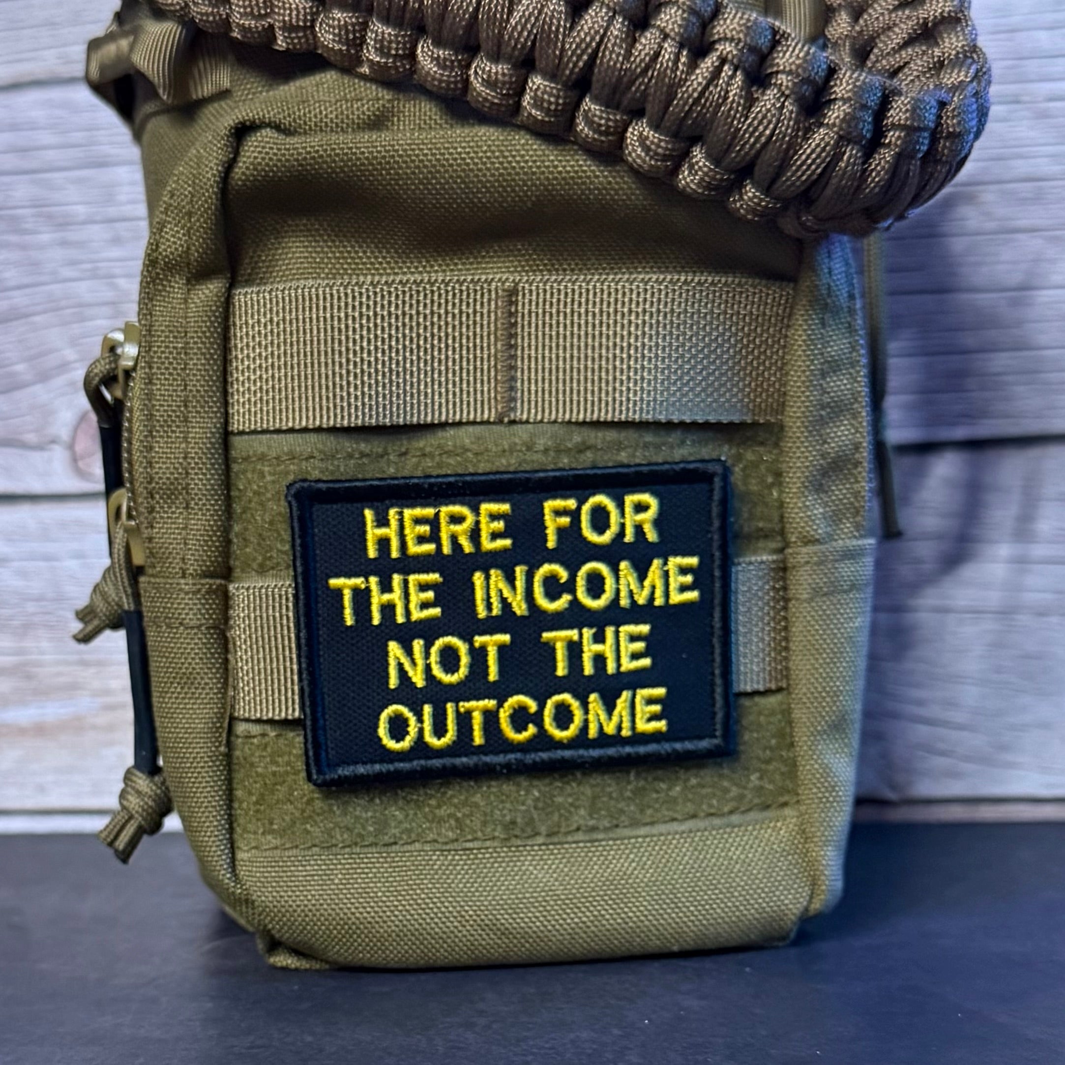 Here For The Income, Not The Outcome Funny Morale Patch, 2x3" | Made in USA | VELCRO® Brand Hook Backing