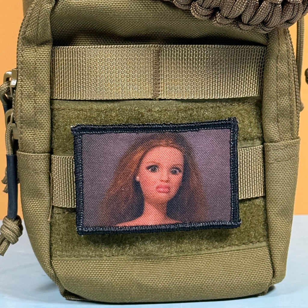 Shocked Doll Meme Funny Morale Patch, 2x3" | Made in USA | VELCRO® Brand Hook Backing