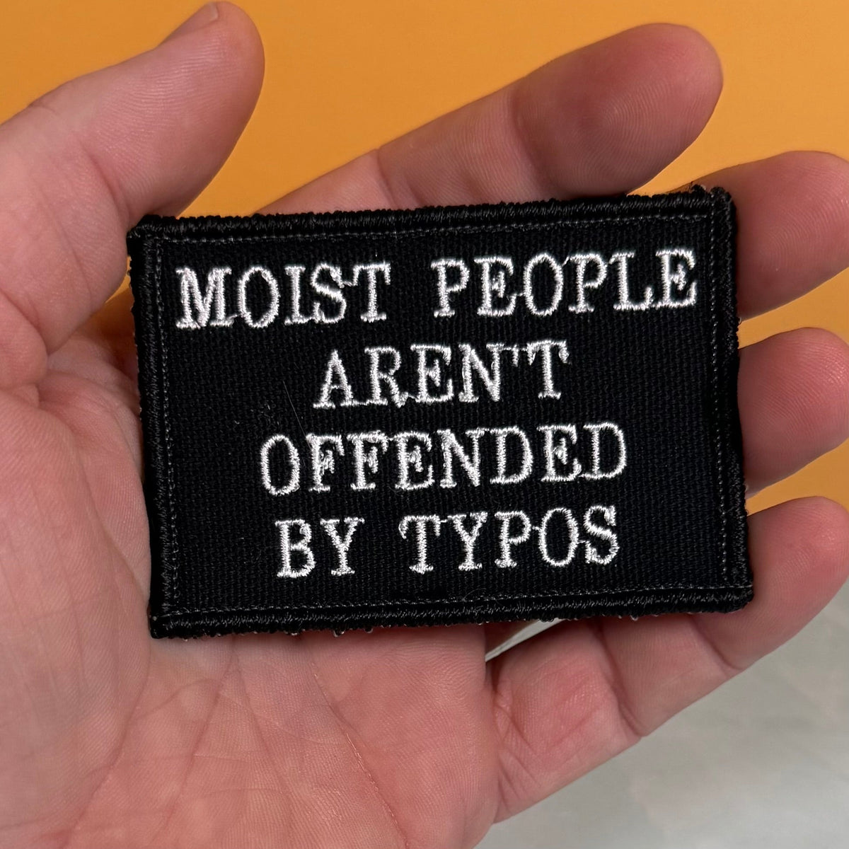 Moist People Aren’t Offended by Typos Funny Morale Patch | Made in USA | VELCRO® Brand Hook Backing