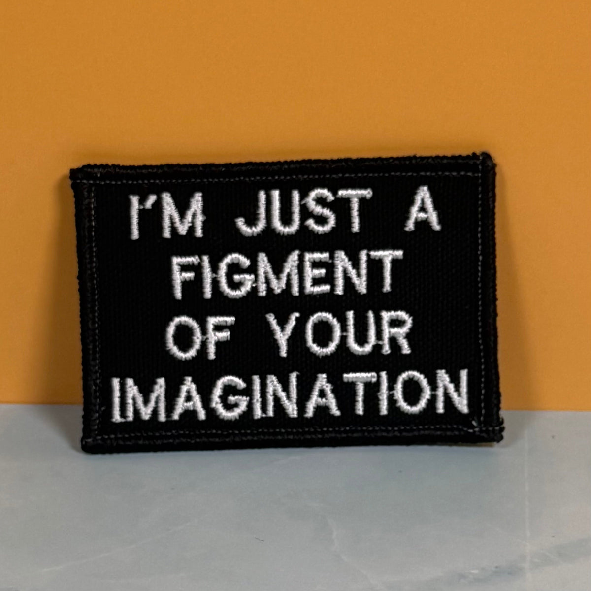 I'm Just A Figment Of Your Imagination Funny Morale Patch, 2x3" | Made in USA | VELCRO® Brand Hook Backing