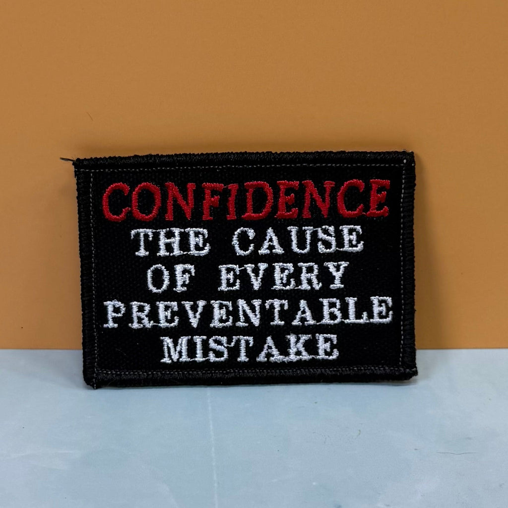 Confidence Causes Mistakes Funny Morale Patch, 2x3" | Made in USA | VELCRO® Brand Hook Backing