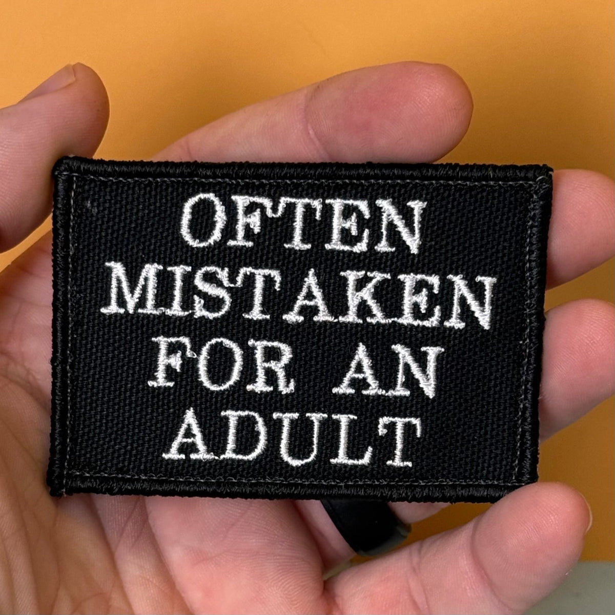 Often Mistaken For An Adult Funny Morale Patch, 2x3" | Made in USA | VELCRO® Brand Hook Backing