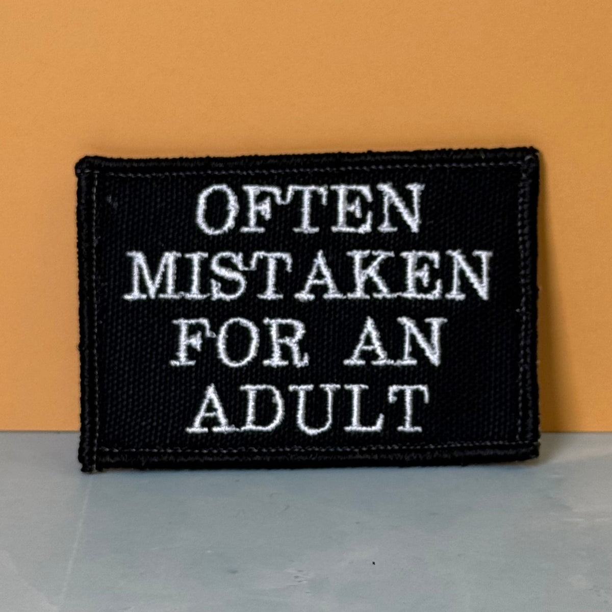 Often Mistaken For An Adult Funny Morale Patch, 2x3" | Made in USA | VELCRO® Brand Hook Backing