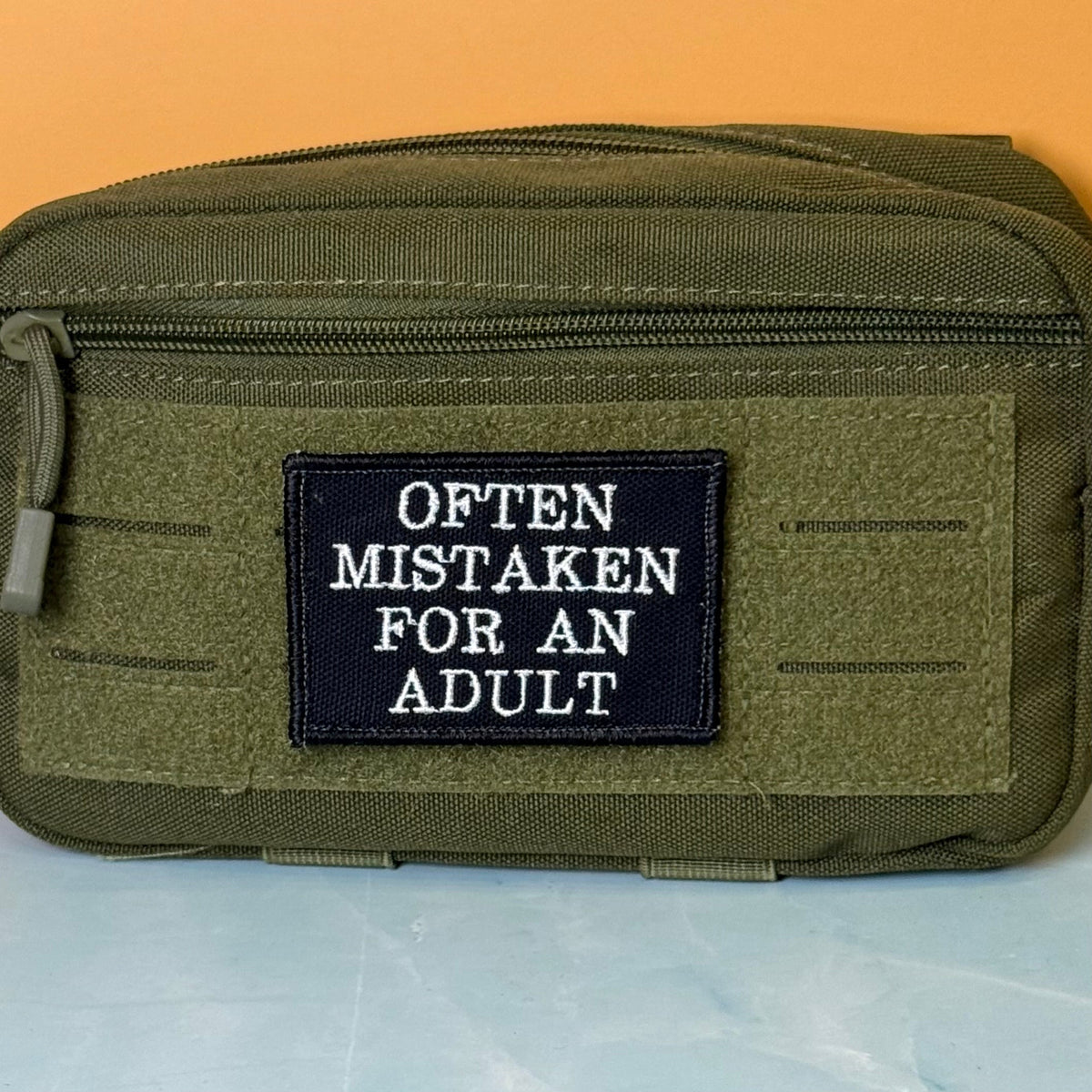 Often Mistaken For An Adult Funny Morale Patch, 2x3" | Made in USA | VELCRO® Brand Hook Backing
