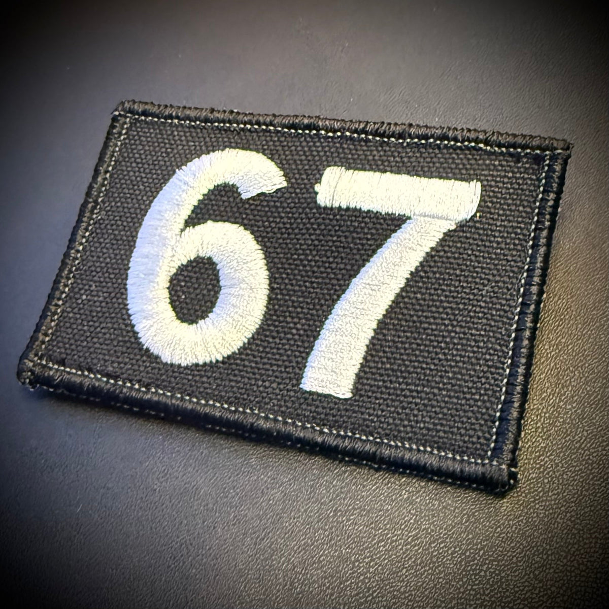 67 -Six Seven- Funny Morale Patch, 2x3" | Made in USA | VELCRO® Brand Hook Backing