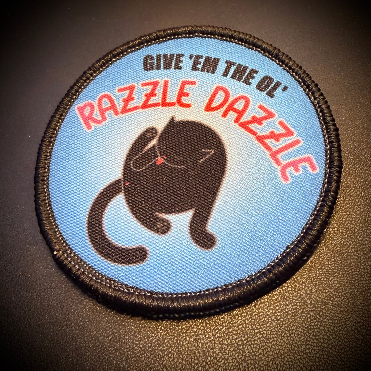 Give 'Em The Razzle Dazzle Funny Morale Patch | Made in USA | VELCRO® Brand Hook Backing
