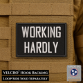 Working Hardly Funny Morale Patch, 2x3" | Made in USA | VELCRO® Brand Hook Backing