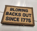 As Seen on Socials - Blowing Backs Out Since 1775 - 2x3 Patch - Coyote w/Black